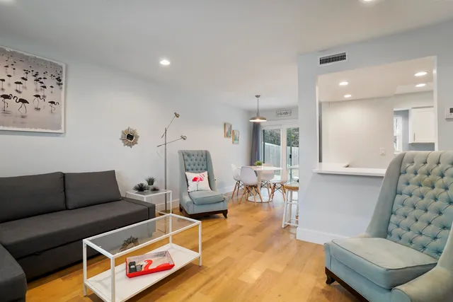 a kitchen with a sink stove and microwave