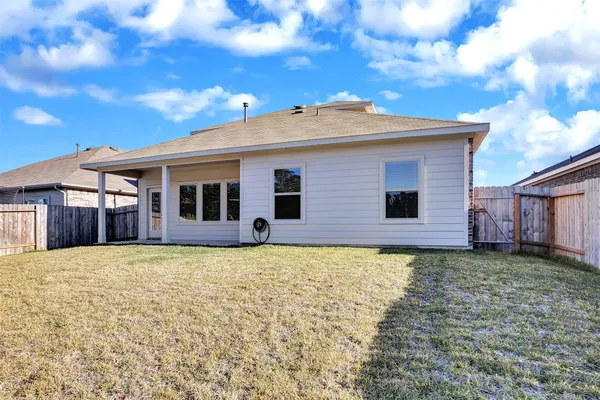 a swimming pool with wooden fence