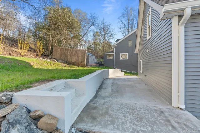 view of living room with furniture and chandelier
