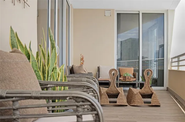 a view of front door with furniture