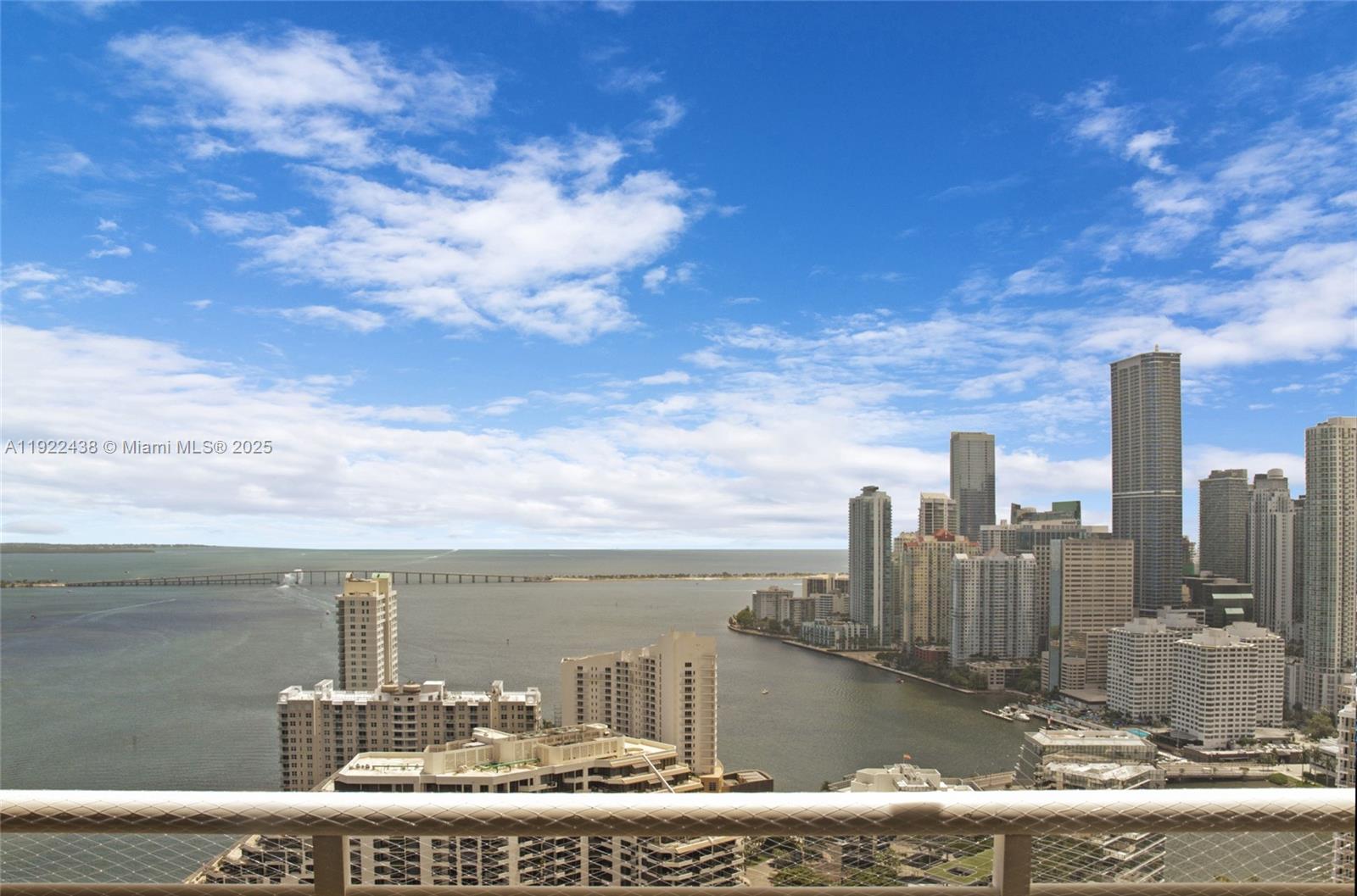 848 Brickell Key Drive, Unit 3905 Miami, FL 33131 - Photo 41 of 47 a view of a lake with a city