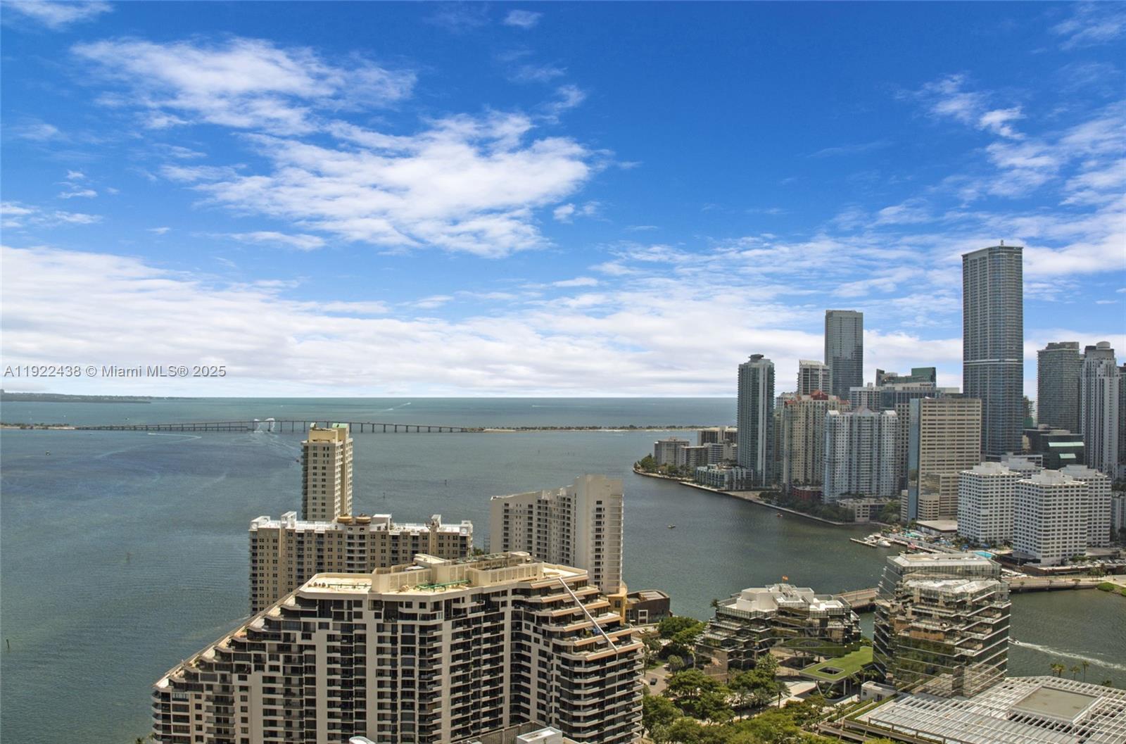 848 Brickell Key Drive, Unit 3905 Miami, FL 33131 - Photo 43 of 47 a view of a lake with a city