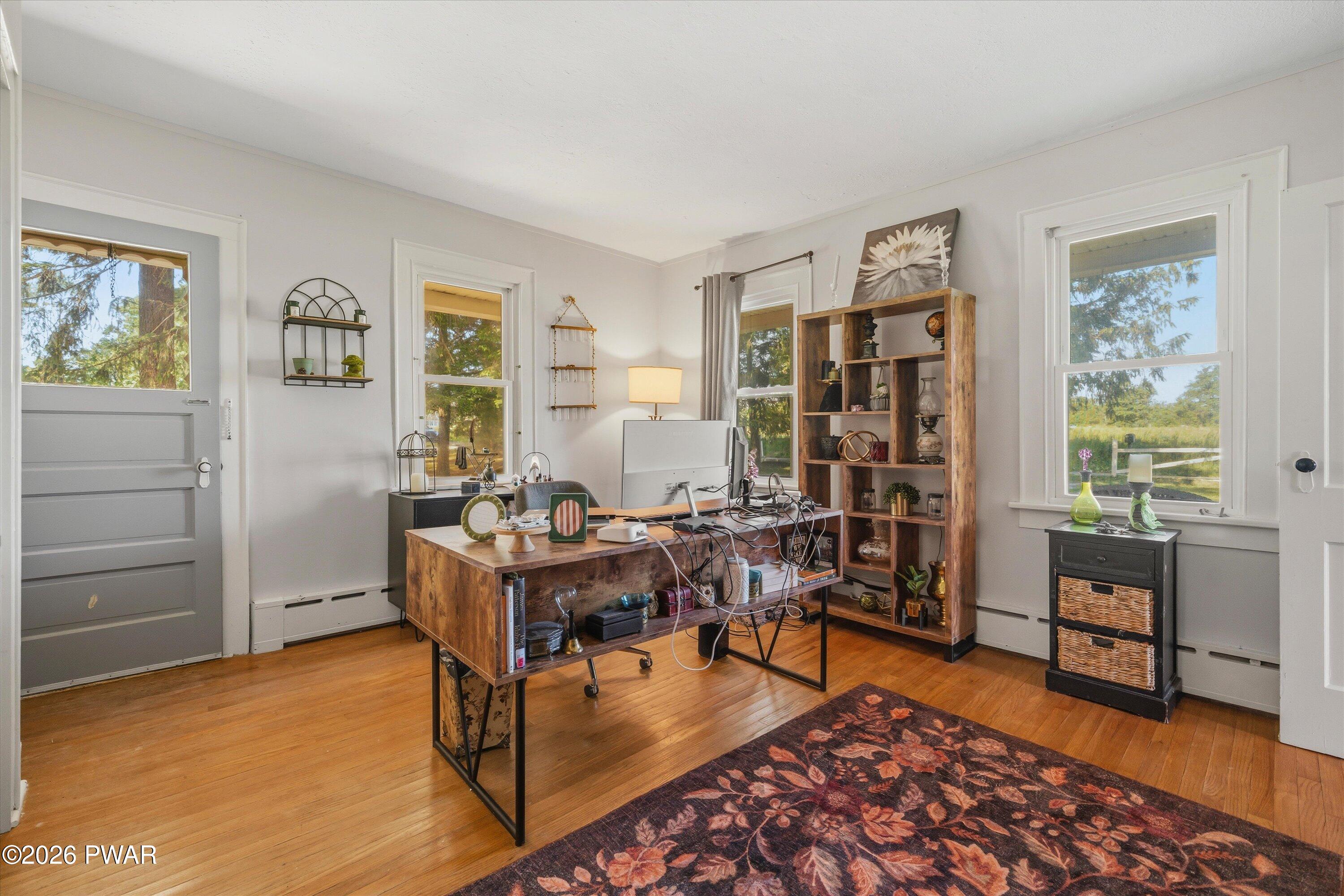 127 Valleyview Road Greentown, PA 18426 - Photo 29 of 66 a living room with furniture a rug and a window