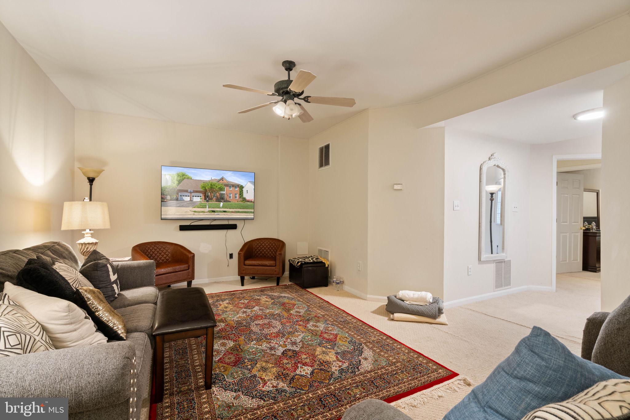 7616 Seabrook Lane Springfield, VA 22153 - Photo 32 of 35 Cozy living space with warm ambiance.