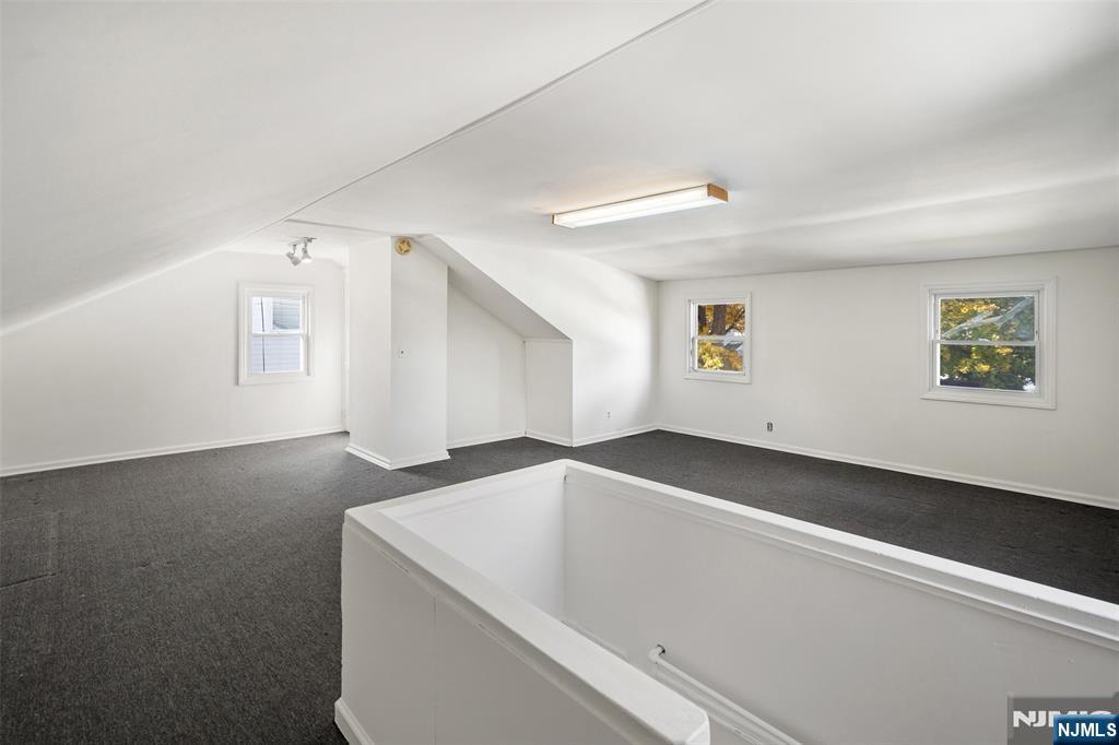 811 Summit Avenue Hackensack, NJ 07601 - Photo 14 of 26 a view of an empty room with windows