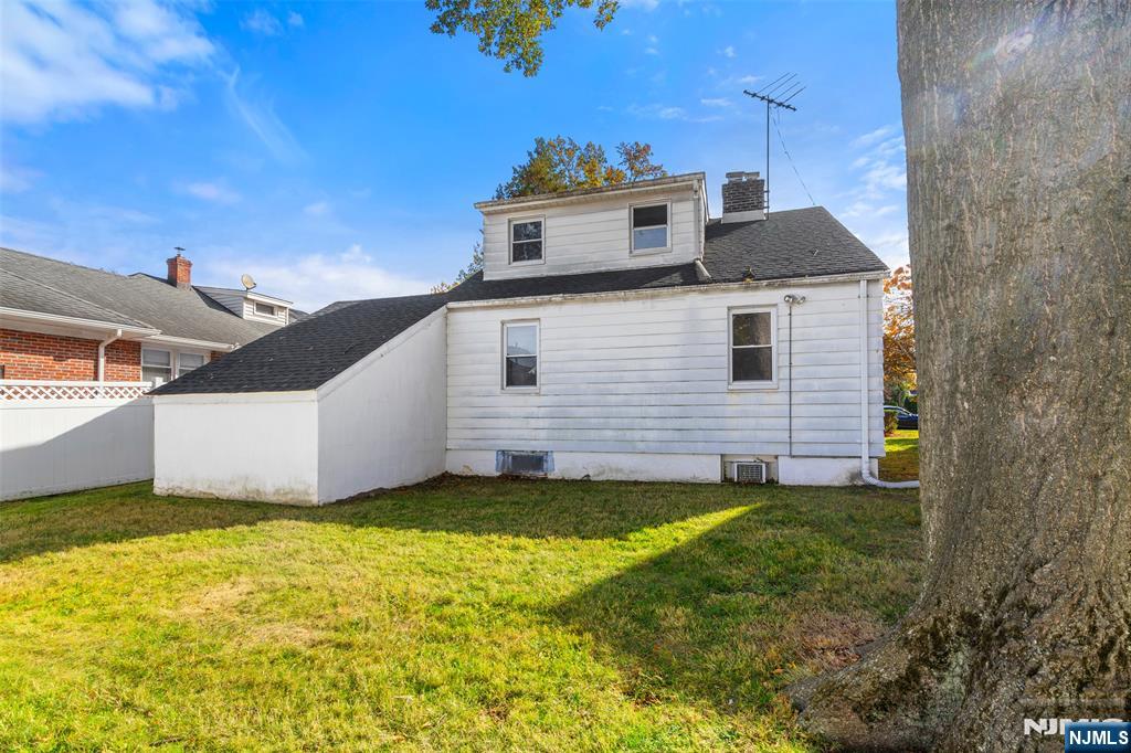 811 Summit Avenue Hackensack, NJ 07601 - Photo 21 of 26 a view of a house with a yard