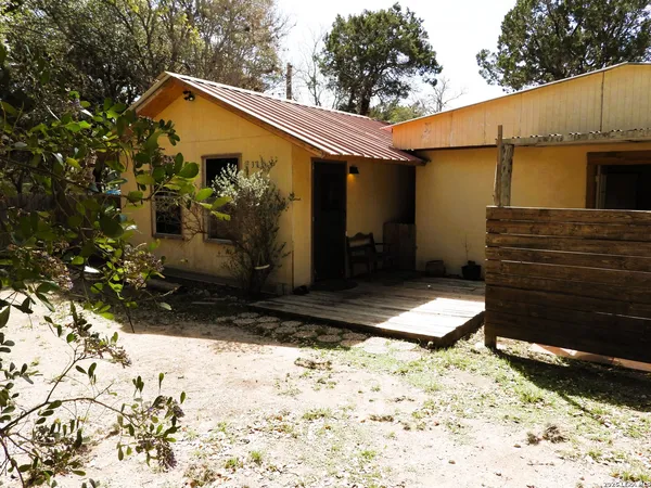 a view of a back yard of the house