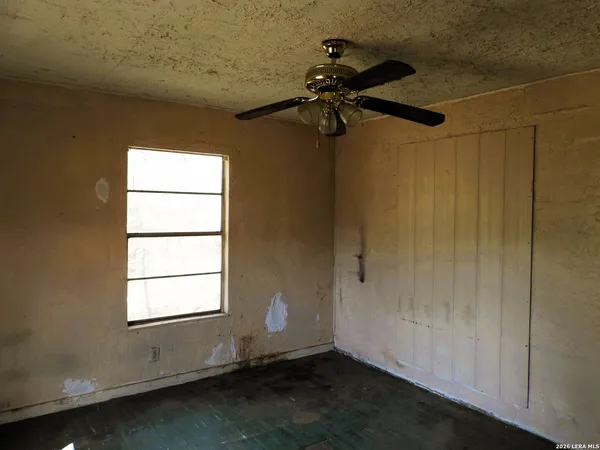 a view of a room with a window