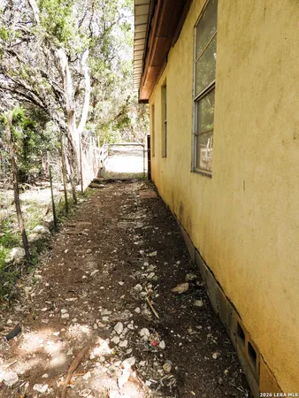 a view of house with yard