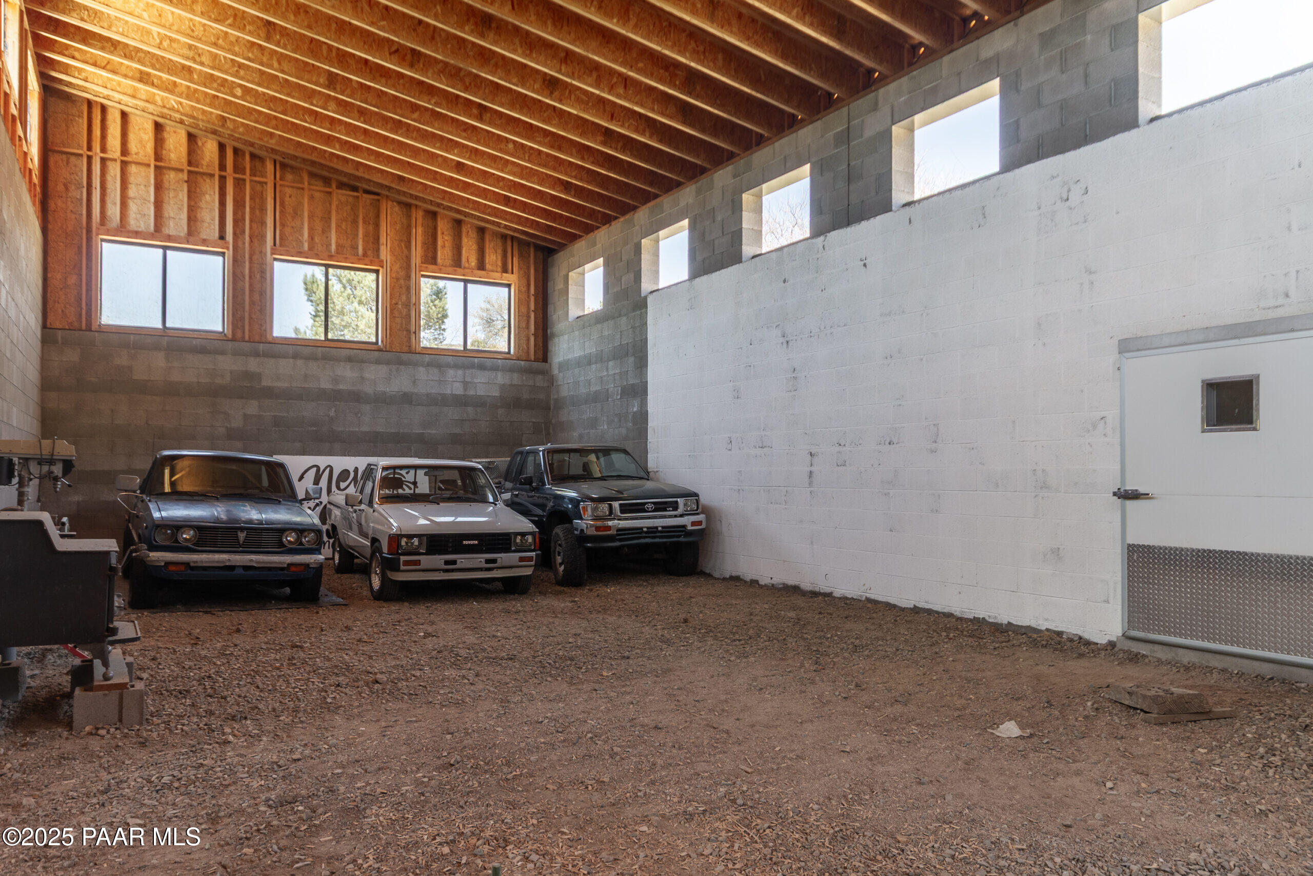1320 Grisby Road Skull Valley, AZ 86338 - Photo 58 of 77 Large-Backroom-of-Workshop.-LG-White-Doo