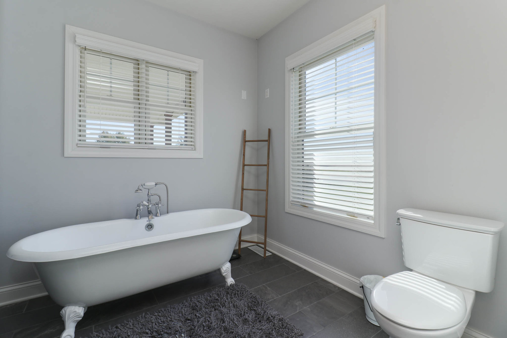 16658 North 200 East Road Danvers, IL 61732 - Photo 26 of 47 a spacious bathroom with a toilet a sink and a window