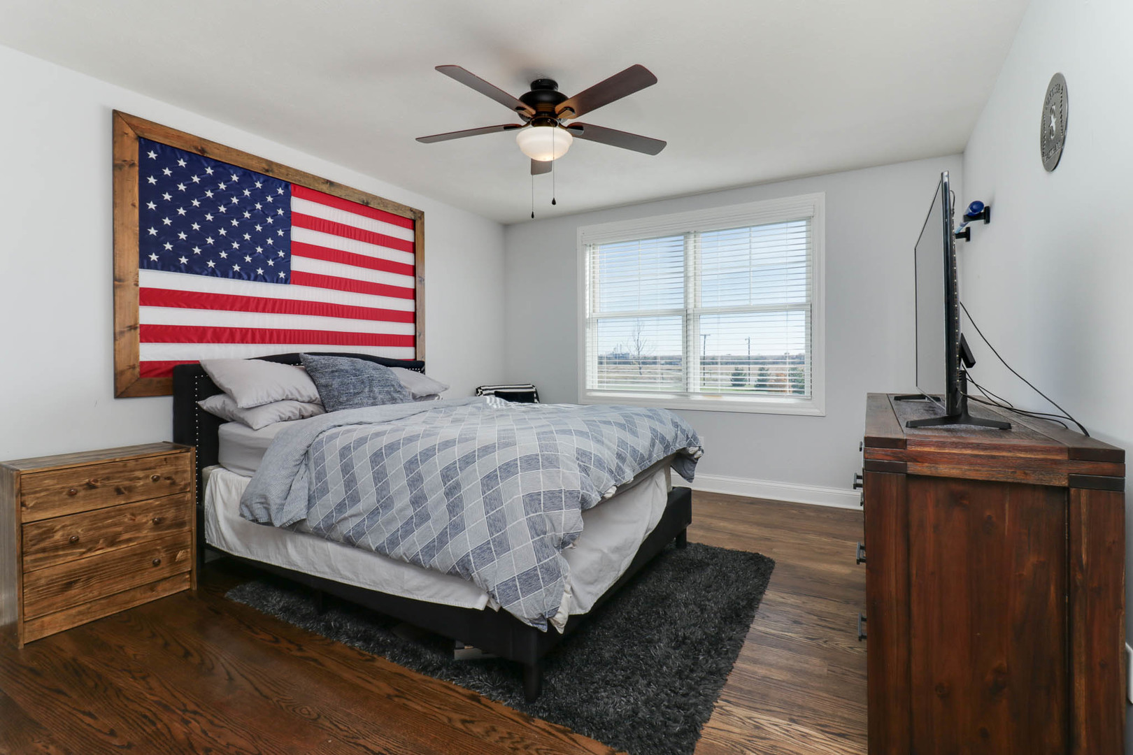 16658 North 200 East Road Danvers, IL 61732 - Photo 29 of 47 a bedroom with a bed and wooden floor
