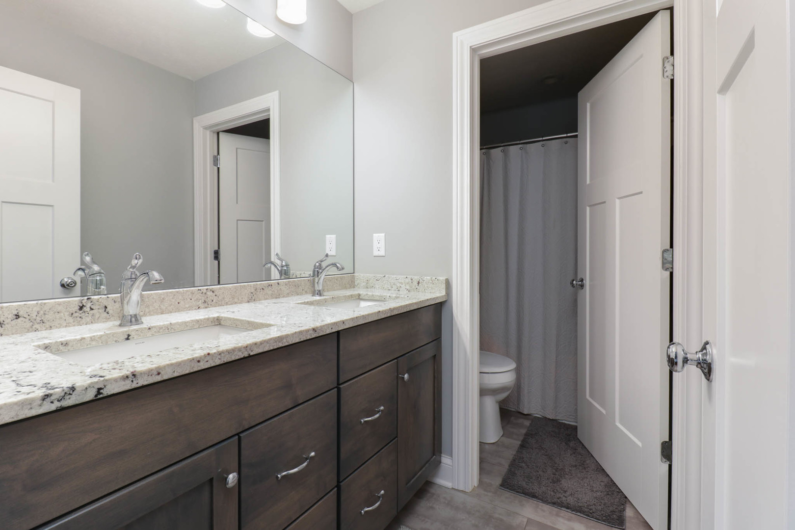 16658 North 200 East Road Danvers, IL 61732 - Photo 31 of 47 a bathroom with a granite countertop sink toilet and shower