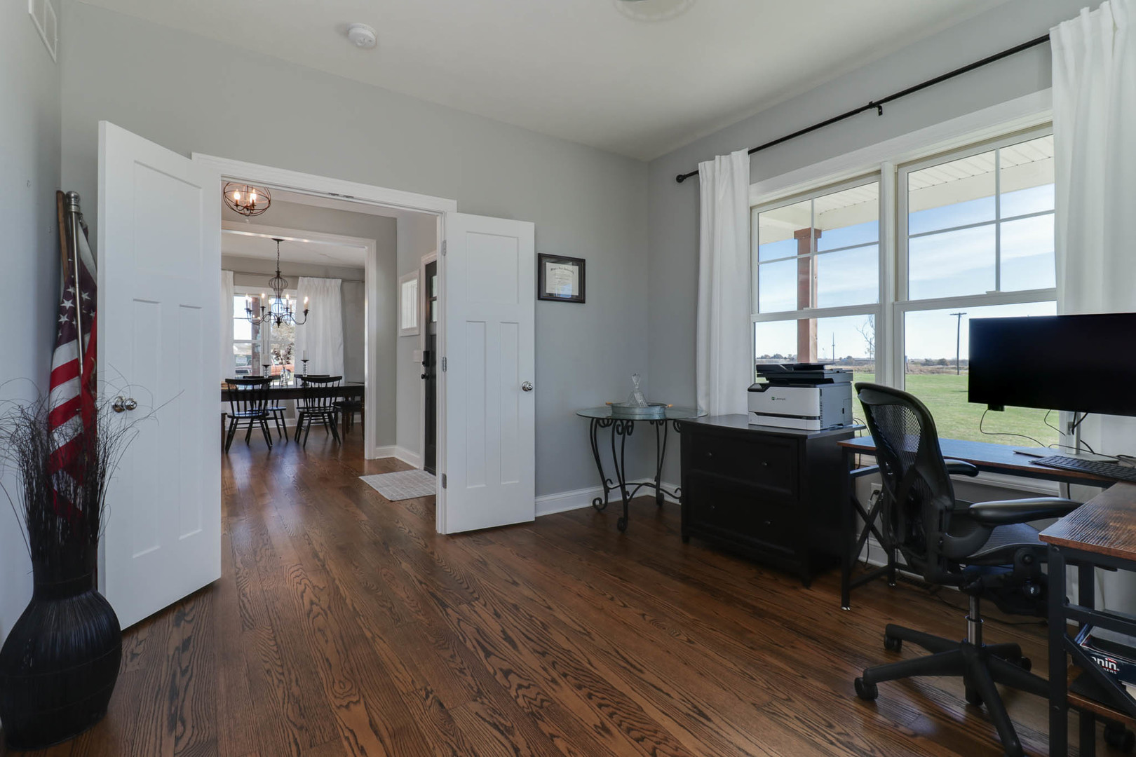 16658 North 200 East Road Danvers, IL 61732 - Photo 8 of 47 a view of a workspace with furniture and a window