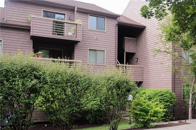 166 Old Brookfield Road, Unit 245 Danbury, CT 06811 - Photo 1 of 1 a view of a house with a yard