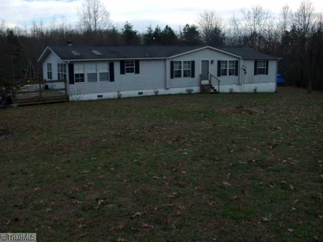 237 Atkinson Road Siloam, NC 27047 - Photo 1 of 16 Exterior Front.