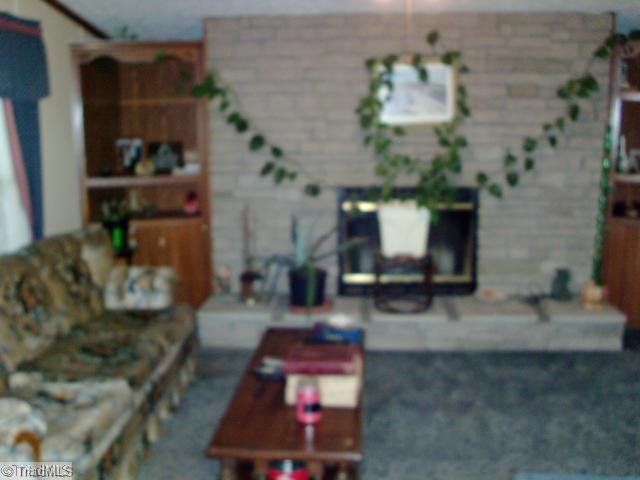 237 Atkinson Road Siloam, NC 27047 - Photo 4 of 16 Living Room.