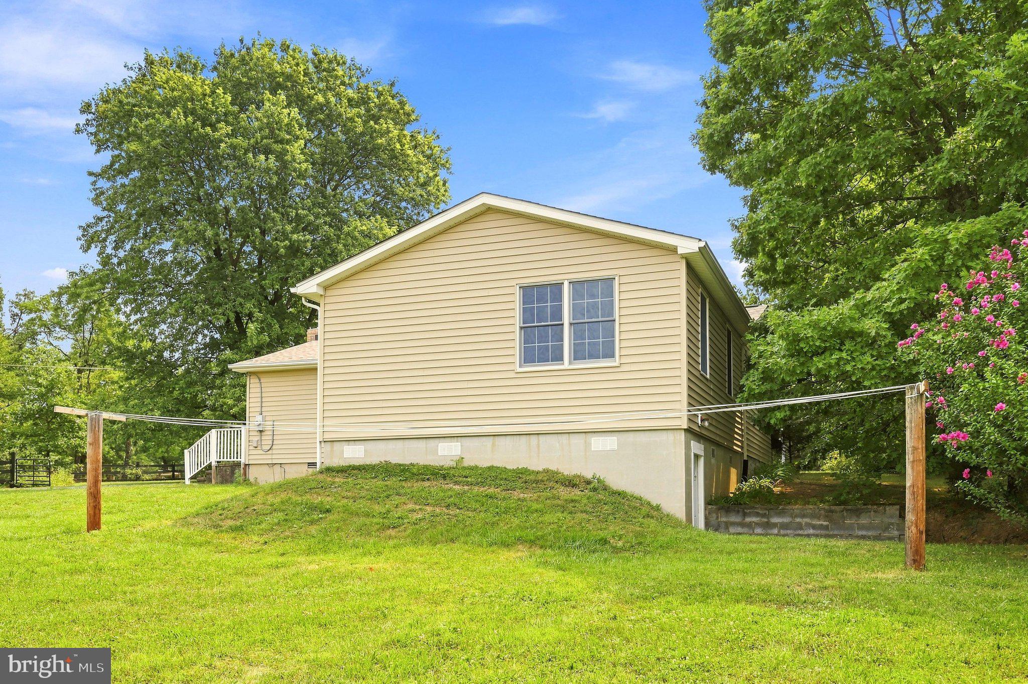 852 McDonald Road Winchester, VA 22602 - Photo 37 of 59 Back Exterior showing clothesline.