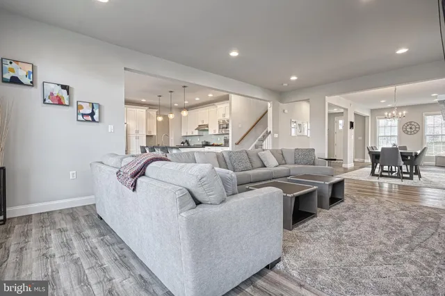 a living room with furniture and a table