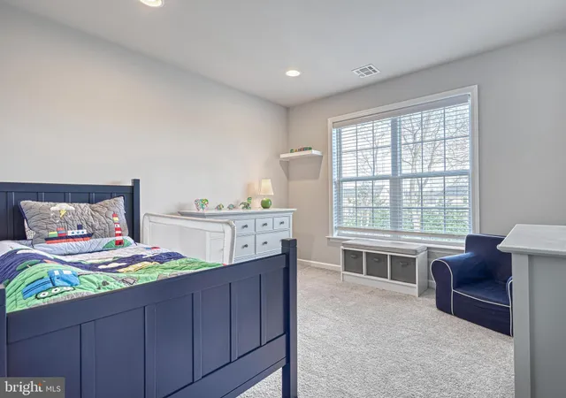 a aerial view of a house with a yard