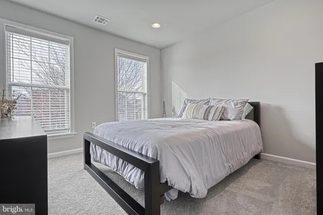 an aerial view of residential house and lake