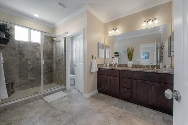 a bedroom with a bed and a closet