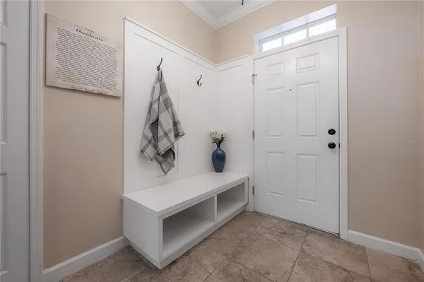 a room that has a rug and a wall in it