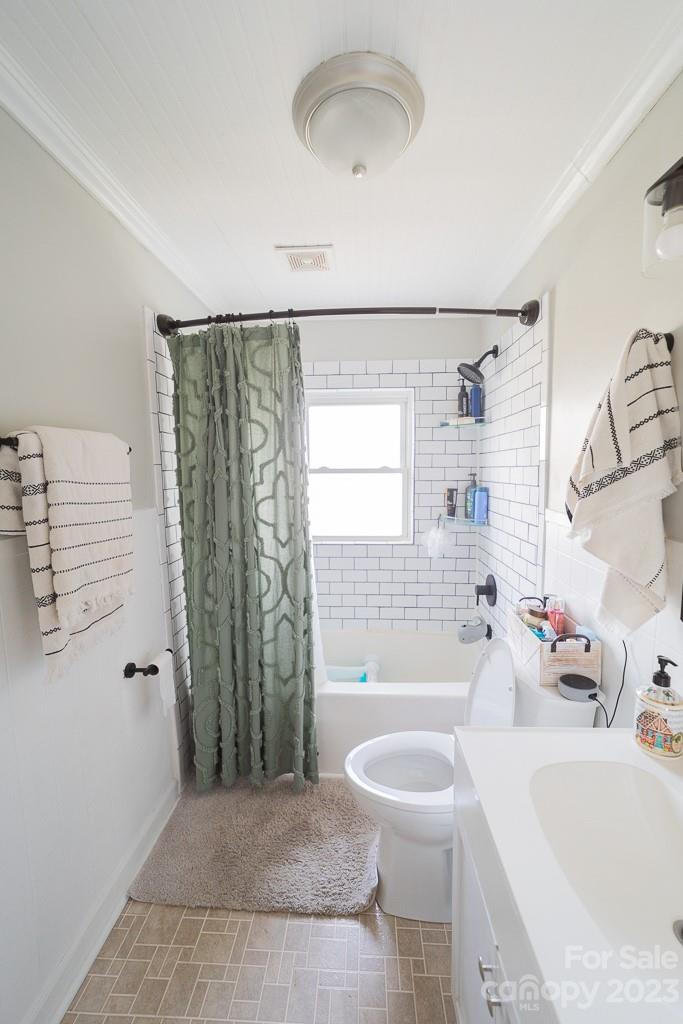 5204 Fish Road Marshville, NC 28103 - Photo 18 of 20 a bathroom with a sink a toilet and shower