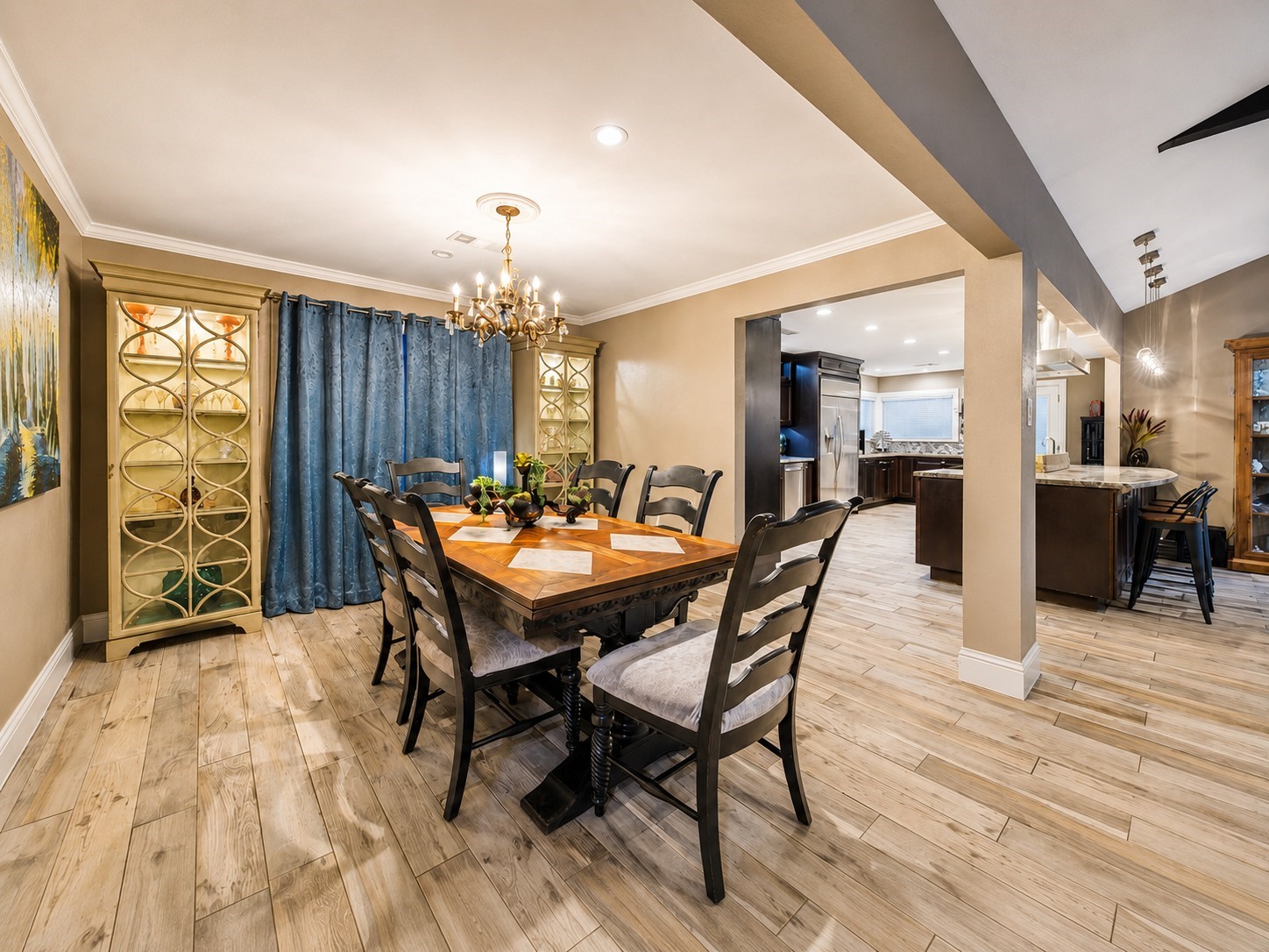 5 Tree Frog Drive Houston, TX 77074 - Photo 7 of 25 a view of a dining room with furniture and wooden floor