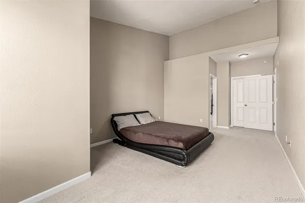 a room with a bed and a table