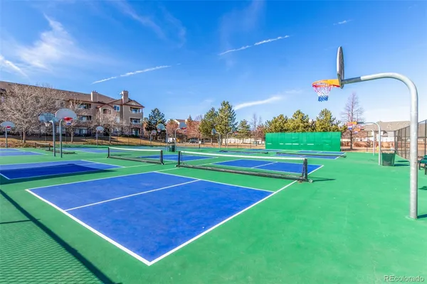 a view of an outdoor space and tennis court