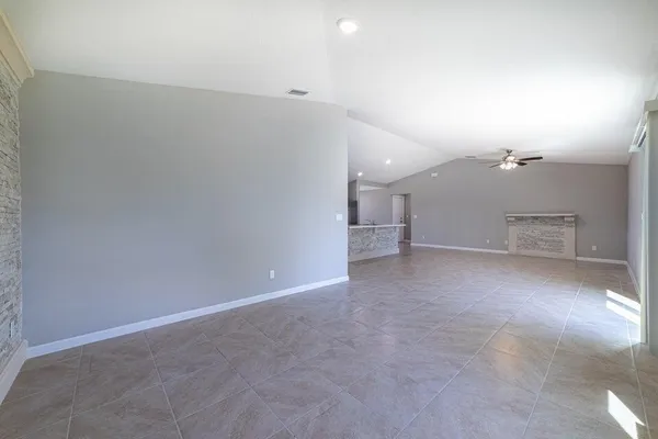 a view of an empty room with a sliding door