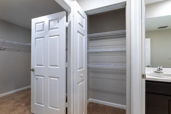 a view of a room with racks on the wall