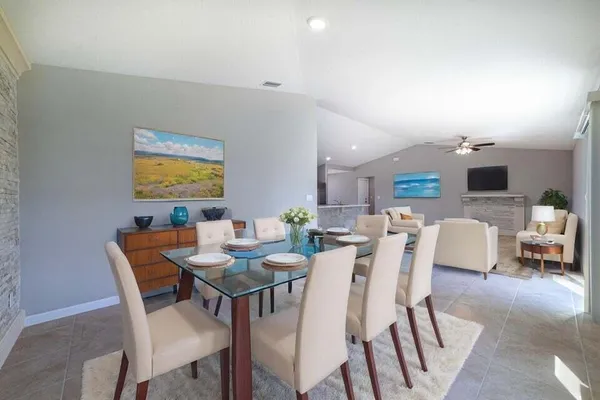a view of a dining room with furniture