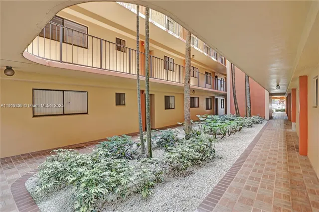 a house view with a garden space