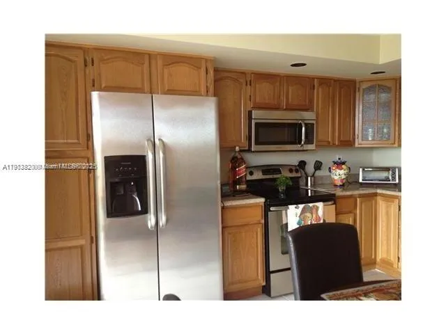 a picture of a living room with a bench