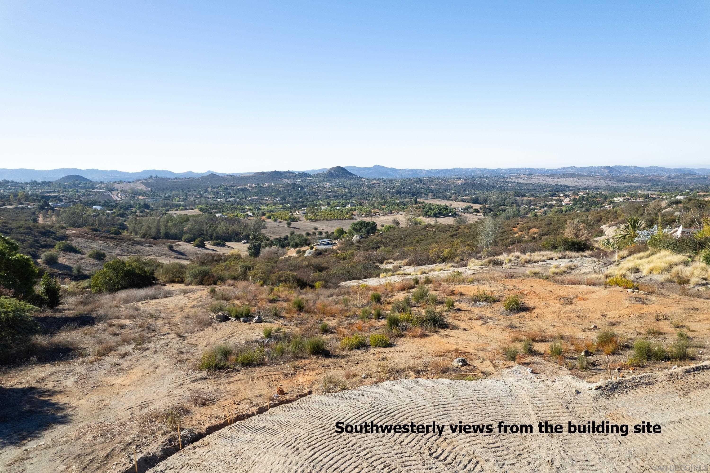4 Rim Of The Valley Valley Center, CA 92082 - Photo 9 of 21 a view of a lake with mountains in the background