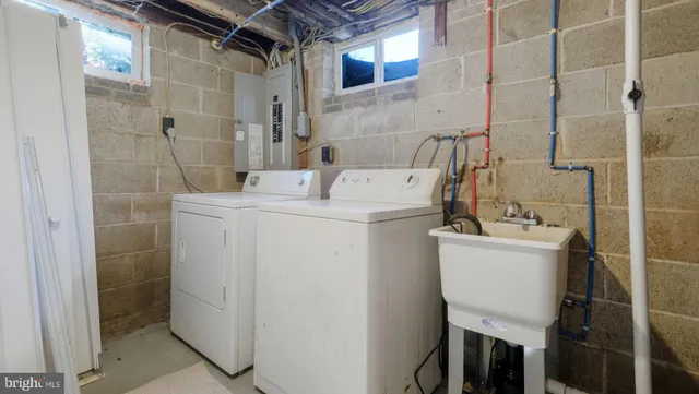 a utility room with dryer and washer