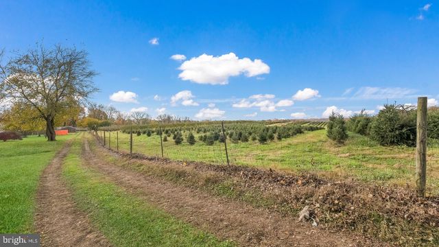 a view of a golf course with a big yard