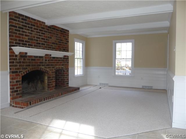 13811 Barnes Spring Road Midlothian, VA 23112 - Photo 4 of 12 a view of empty room with a fireplace