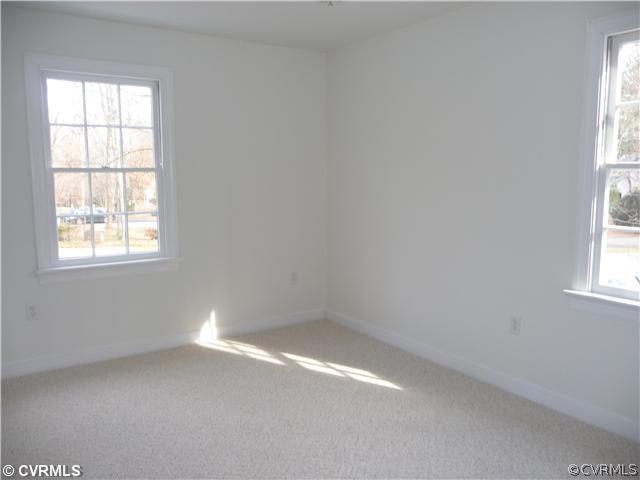 13811 Barnes Spring Road Midlothian, VA 23112 - Photo 9 of 12 an empty room with a window