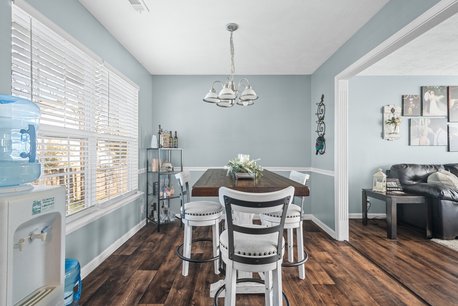 1413 Fall Parkway Murfreesboro, TN 37129 - Photo 18 of 51 a view of a dining room with furniture a chandelier and wooden floor