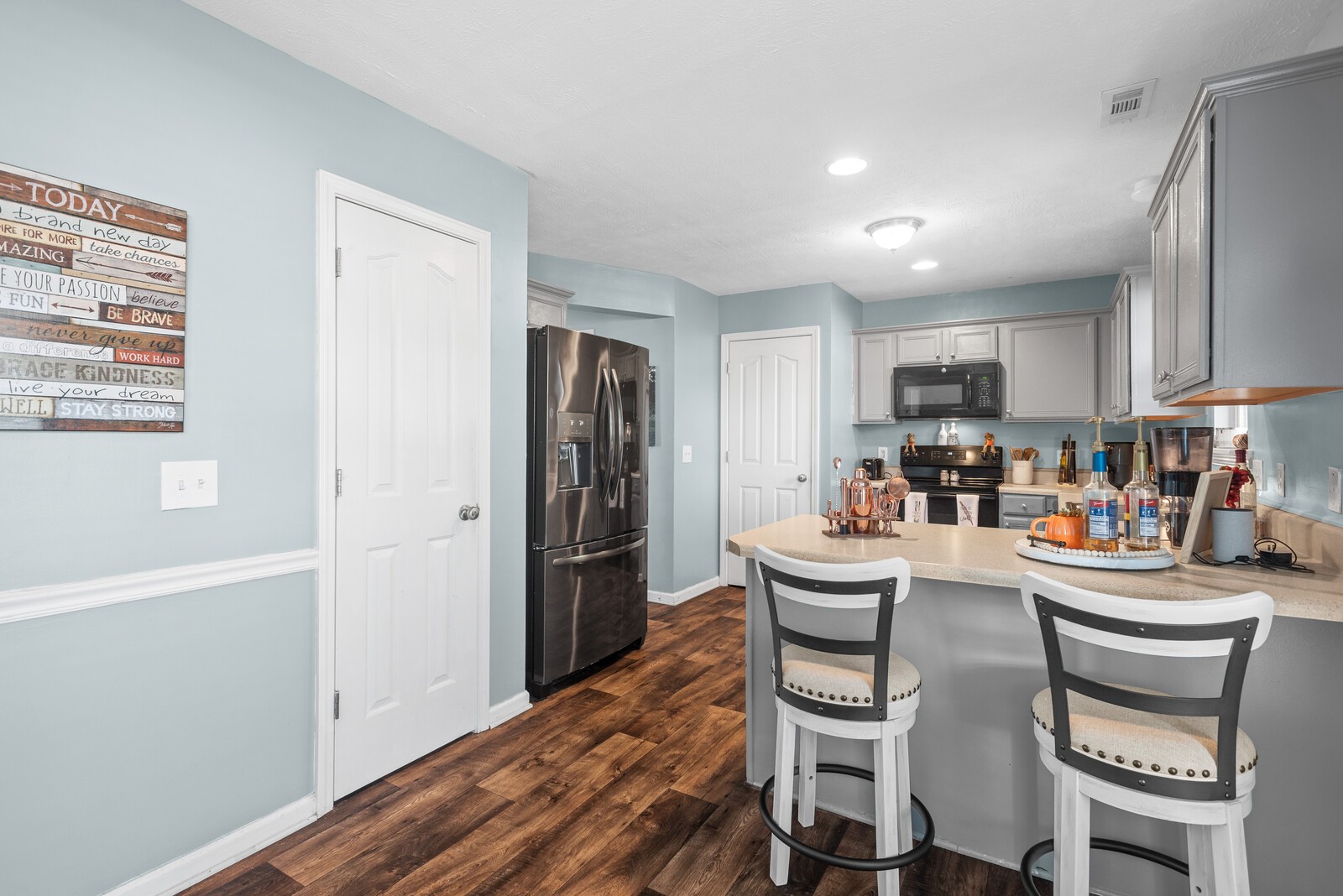 1413 Fall Parkway Murfreesboro, TN 37129 - Photo 21 of 51 a kitchen with a refrigerator and table chair