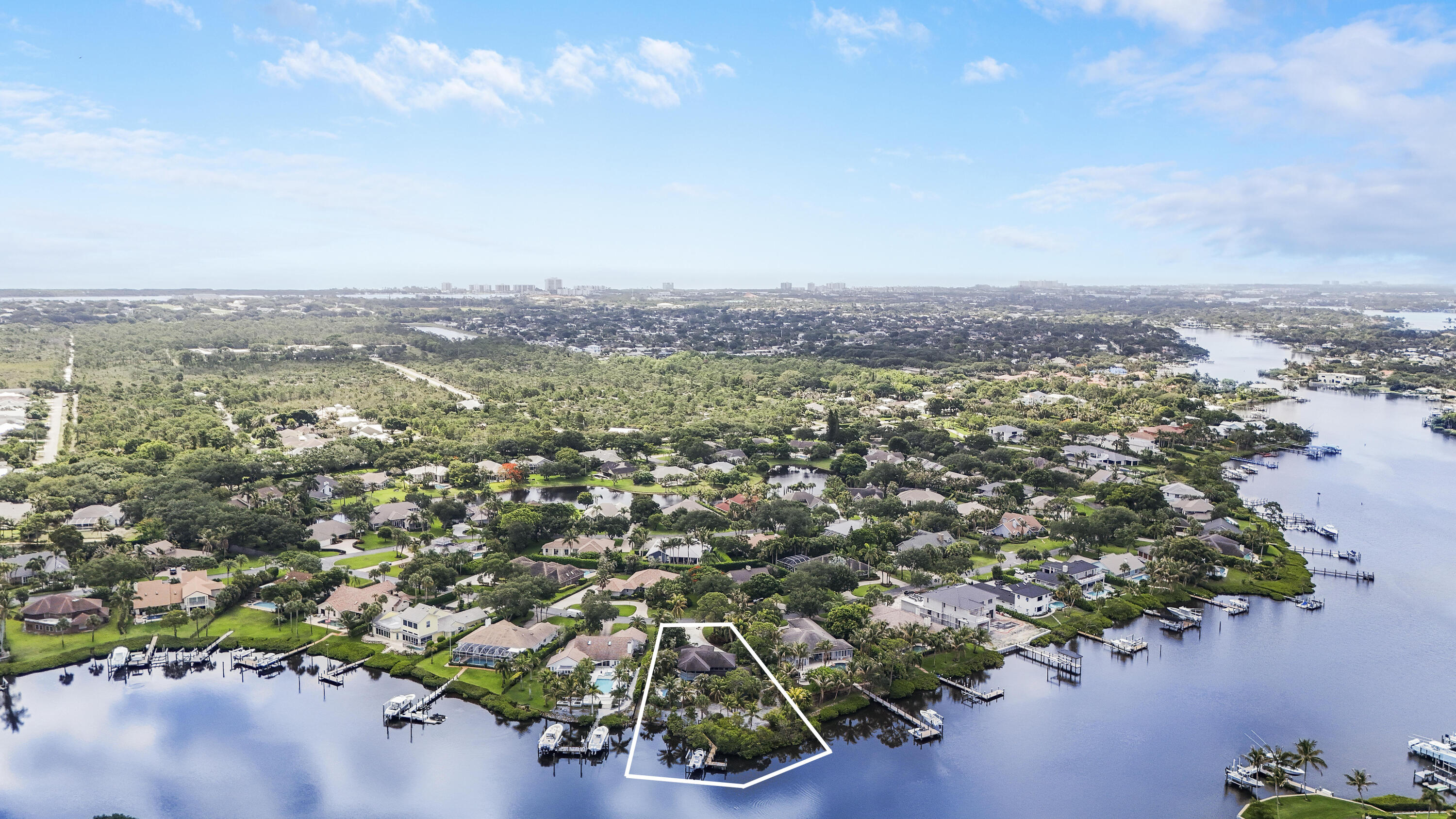 18791 Southeast River Ridge Road Jupiter, FL 33469 - Photo 3 of 25 an aerial view of a city
