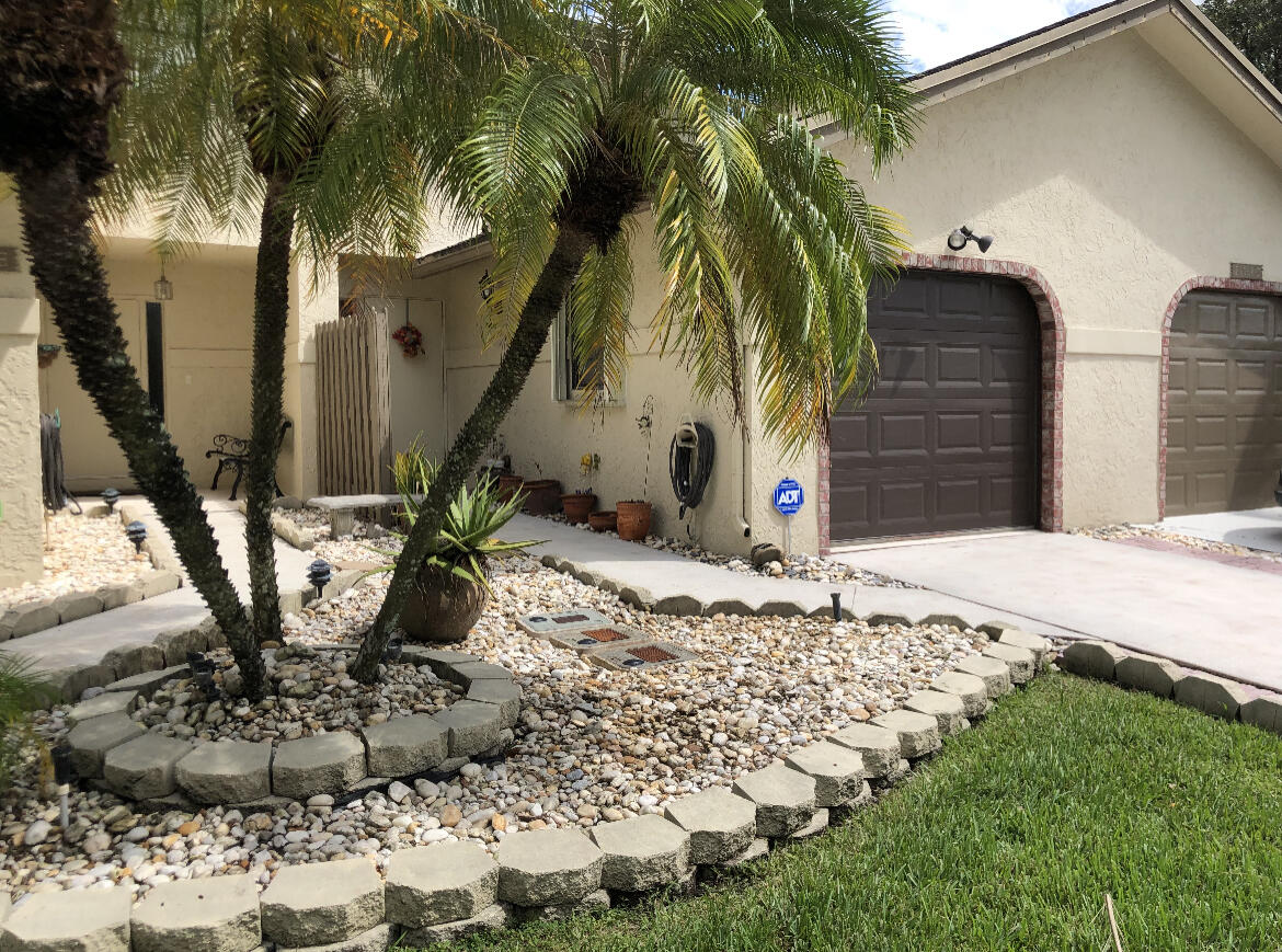 23358 Southwest 55th Avenue, Unit D Boca Raton, FL 33433 - Photo 1 of 19 Front Exterior