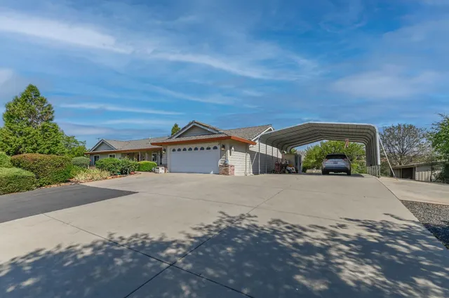 a view of a outdoor space with a patio