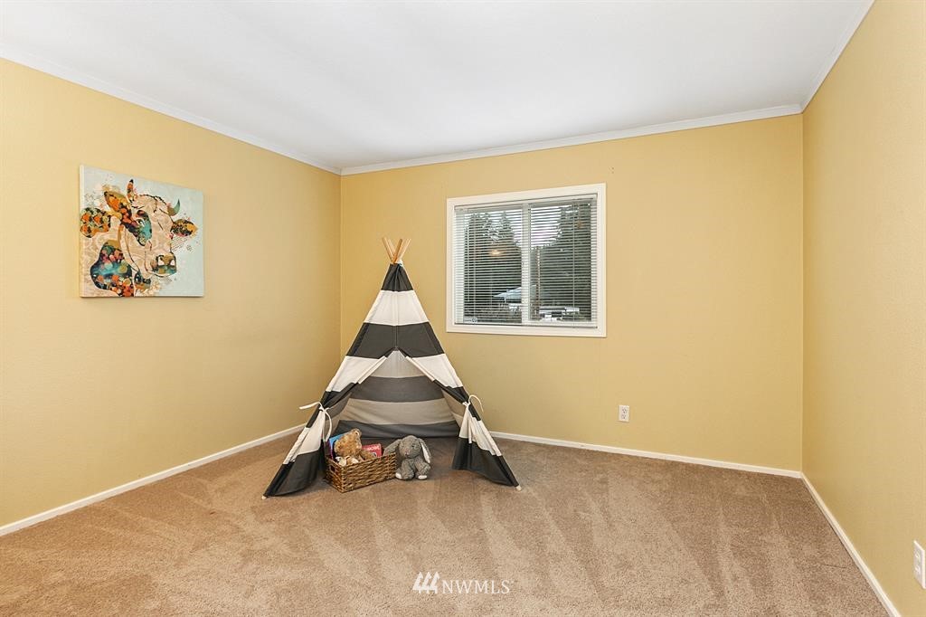 520 North Carpenter Road Snohomish, WA 98290 - Photo 15 of 25 a room with a window and couch
