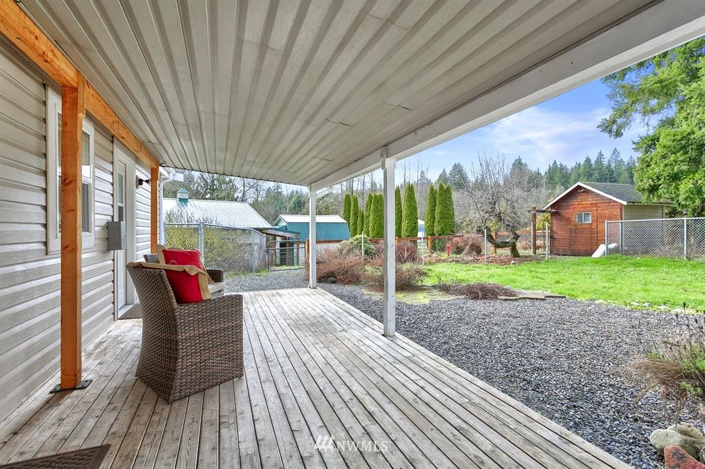 520 North Carpenter Road Snohomish, WA 98290 - Photo 18 of 25 a view of a house with backyard and porch