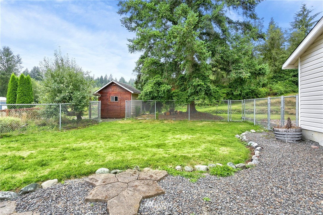 520 North Carpenter Road Snohomish, WA 98290 - Photo 19 of 25 a house view with a garden space