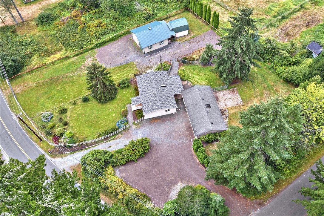 520 North Carpenter Road Snohomish, WA 98290 - Photo 25 of 25 an aerial view of a house with a garden and yard